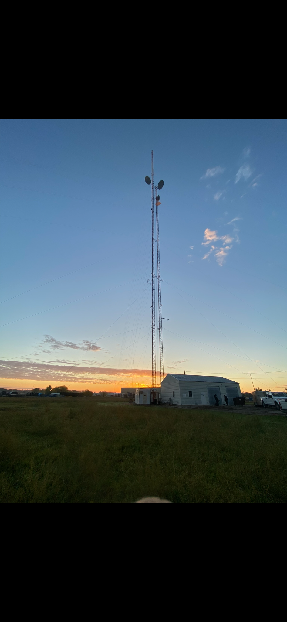 Tower at sunset with golden sky